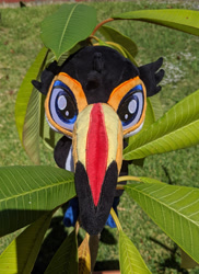 Size: 1947x2677 | Tagged: safe, artist:dungeondwellerrescue, derpibooru import, oc, oc only, oc:tristão, bird, griffon, toucan, beak, commission, folded wings, irl, looking at you, male, ocelot, photo, plushie, solo, spots, talons, toco toucan, toucan griffon, wings