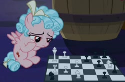 Size: 714x470 | Tagged: safe, derpibooru import, screencap, cozy glow, pegasus, pony, the summer sun setback, barrel, chess, chessboard, cropped, solo