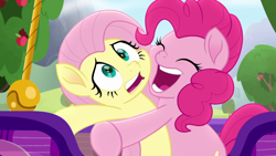 Size: 1920x1080 | Tagged: safe, derpibooru import, screencap, fluttershy, pinkie pie, earth pony, pegasus, pony, rainbow roadtrip, female, hug, mare