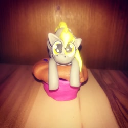 Size: 1080x1080 | Tagged: safe, artist:rxndxm.artist, derpibooru import, derpy hooves, pegasus, pony, craft, eyelashes, female, food, irl, mare, muffin, photo, sculpture, solo, traditional art