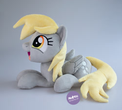 Size: 1400x1260 | Tagged: safe, artist:meplushyou, derpibooru import, derpy hooves, pegasus, pony, food, irl, lying down, photo, plushie, prone, solo