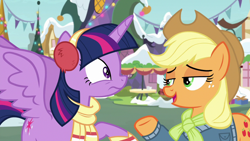 Size: 1280x720 | Tagged: safe, screencap, applejack, twilight sparkle, twilight sparkle (alicorn), alicorn, earth pony, pony, best gift ever, applejack's hat, christmas, duo, earmuffs, female, female focus, looking at each other, ponyville, raised hoof, scarf, silence, solo focus, spread wings