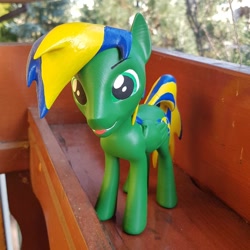 Size: 1024x1024 | Tagged: safe, artist:mraagh, derpibooru import, oc, oc only, oc:chacek, pegasus, pony, 3d, 3d printed, blender, eyebrows, figurine, green coat, green eyes, irl, male, multicolored hair, multicolored mane, open eyes, photo, sfm pony, shadow, silly, solo, spiky mane, stallion, standing, statue, tongue out