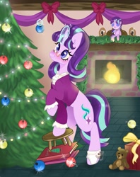 Size: 1621x2048 | Tagged: safe, artist:pineappleartz, derpibooru import, snowfall frost, starlight glimmer, pony, unicorn, christmas, christmas tree, clothes, decorating, doll, female, fireplace, glasses, glowing horn, hearth's warming doll, holiday, horn, mare, present, solo, toy, tree