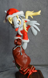 Size: 872x1420 | Tagged: safe, artist:prototypespacemonkey, derpy hooves, pegasus, pony, christmas, clothes, female, mare, present, santa costume, sculpture