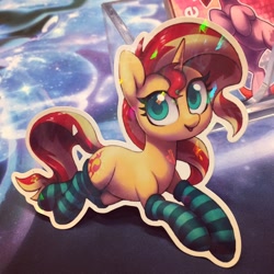 Size: 1280x1280 | Tagged: safe, artist:dawnfire, sunset shimmer, pony, unicorn, clothes, cute, female, irl, looking at you, mare, photo, socks, solo, sticker, striped socks