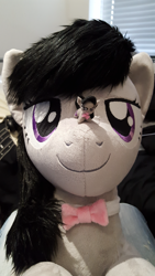 Size: 1836x3264 | Tagged: safe, artist:qtpony, artist:tinyequine, octavia melody, earth pony, pony, bowtie, cute, irl, looking at you, macro, micro, photo, plushie, self ponidox, size difference, tavibetes, tongue out