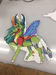 Size: 960x1280 | Tagged: safe, artist:nightmare-moons-throneroom, queen chrysalis, changedling, changeling, changeling queen, armor, female, horns, looking at you, mandibles, peacock feathers, purified chrysalis, raised hoof, reformed, smiling, solo, spread wings, traditional art, wings