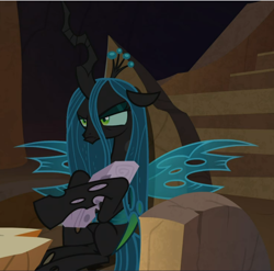 Size: 952x940 | Tagged: safe, screencap, queen chrysalis, twilog, changeling, changeling queen, frenemies (episode), chair, cropped, log, narrowed eyes, pouting, sitting, solo