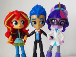 Size: 1440x1080 | Tagged: safe, artist:whatthehell!?, flash sentry, sci-twi, sunset shimmer, twilight sparkle, equestria girls, boots, clothes, doll, dress, equestria girls minis, female, flashimmer, flashlight, irl, jacket, male, pair, pencil, photo, sciflash, sciflashshimmer, shipping, shoes, straight, toy, tuxedo