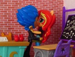Size: 1400x1050 | Tagged: safe, artist:whatthehell!?, flash sentry, sunset shimmer, equestria girls, apple, boots, chair, classroom, clothes, desk, doll, equestria girls minis, female, flashimmer, food, guitar, irl, jacket, kissing, male, pair, pants, photo, school, shipping, shoes, straight, toy, tuxedo