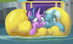 Size: 1024x623 | Tagged: safe, artist:raikoh, starlight glimmer, trixie, pony, unicorn, road to friendship, cheek squish, cheek to cheek, duo, female, ghastly gorge, i guess we're stuck together, inflatable, inflatable raft, mare, one eye closed, prone, raft, river, scene interpretation, shipping fuel, squished, squishy, squishy cheeks, water, we're friendship bound
