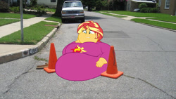 Size: 1024x576 | Tagged: safe, artist:jamesawilliams1996, artist:neongothic, artist:secretgoombaman12345, sunset shimmer, series:sunset's great when she's fat, equestria girls, bbw, belly, big belly, breasts, car, chubby cheeks, clothes, cone, equestria girls in real life, fat, female, huge belly, irl, manhole, morbidly obese, obese, pajamas, photo, road, slobset shimmer, ssbbw, stuck, tight clothing, wat