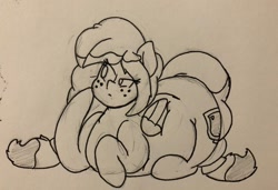 Size: 1280x873 | Tagged: safe, artist:somefrigginnerd, oc, oc only, oc:sweeter mocha, pony, chubby, fat, female, freckles, lineart, monochrome, prone, simple background, solo, thinking, traditional art