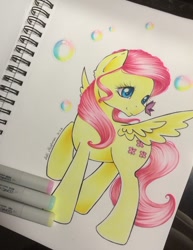 Size: 702x907 | Tagged: safe, artist:nellix, fluttershy, butterfly, pegasus, pony, female, insect on nose, looking at something, mare, marker drawing, raised hoof, solo, spread wings, traditional art