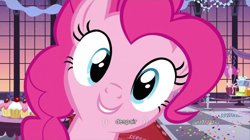 Size: 852x477 | Tagged: safe, derpibooru import, screencap, pinkie pie, earth pony, pony, cupcake, despair, female, looking at you, mare, smiling, solo, youtube caption