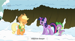 Size: 853x474 | Tagged: safe, derpibooru import, screencap, applejack, spike, twilight sparkle, dragon, earth pony, pony, unicorn, winter wrap up, female, male, mare, religion, snow, winter wrap up vest, youtube caption