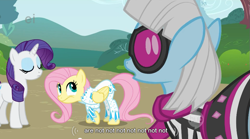 Size: 853x474 | Tagged: safe, derpibooru import, screencap, fluttershy, photo finish, rarity, pegasus, pony, unicorn, nudie suit, youtube caption