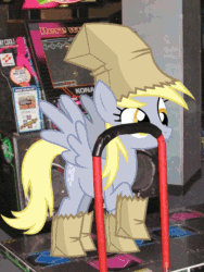 Size: 555x740 | Tagged: safe, artist:arrkhal, derpy hooves, pegasus, pony, animated, dance dance revolution, dancing, female, irl, mare, paper bag, paper bag wizard, photo, ponies in real life, rhythm game