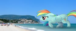 Size: 1200x490 | Tagged: safe, artist:fandroit, rainbow dash, pony, beach, giant pony, giant rainbow dash, irl, macro, mega/giant rainbow dash, photo, ponies in real life