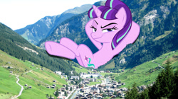 Size: 1195x669 | Tagged: safe, artist:theotterpony, artist:xebck, starlight glimmer, pony, giant pony, giant starlight glimmer, hill, irl, macro, mountain, photo, ponies in real life, raised eyebrow, smiling, switzerland, tree, vector