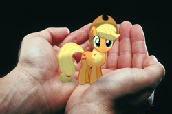 Size: 1200x796 | Tagged: safe, artist:barbra, applejack, earth pony, pony, appletini, in goliath's palm, irl, micro, photo, ponies in real life, tiny ponies, vector