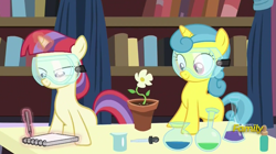 Size: 1135x637 | Tagged: safe, screencap, lemon hearts, moondancer, pony, celestial advice, alchemy, blank flank, cute, discovery family logo, female, filly, flask, flower, flower pot, goggles, lemonbetes, levitation, looking at something, magic, notebook, pen, potion, safety goggles, telekinesis, writing, younger