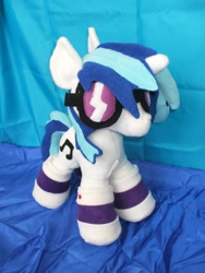 Size: 2136x2848 | Tagged: safe, artist:kittyfoot, dj pon-3, vinyl scratch, clothes, irl, photo, plushie, socks, solo, striped socks