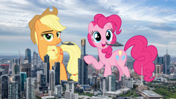 Size: 2500x1400 | Tagged: safe, artist:dashiesparkle, artist:theotterpony, applejack, pinkie pie, earth pony, pony, australia, city, cowboy hat, female, freckles, giant pony, hat, helicopter, highrise ponies, irl, macro, mare, melbourne, open mouth, photo, ponies in real life, raised hoof, stetson, story in the source