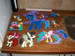 Size: 768x576 | Tagged: safe, artist:rphb, apple bloom, applejack, derpy hooves, gilda, princess celestia, trixie, twilight sparkle, alicorn, earth pony, griffon, pegasus, pony, book, female, mare, perler beads, photo