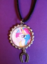 Size: 298x400 | Tagged: safe, princess celestia, alicorn, pony, female, horn, jewelry, mare, merchandise, multicolored mane, necklace, solo, white coat