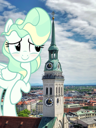 Size: 1800x2400 | Tagged: safe, artist:slb94, vapor trail, pegasus, pony, blushing, building, church, female, giant pony, giantess, highrise ponies, irl, macro, mare, munich, photo, ponies in real life, raised hoof, solo