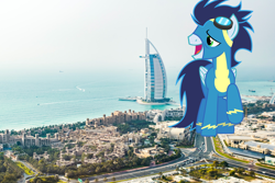 Size: 2400x1600 | Tagged: safe, artist:dashiesparkle, artist:jerryakiraclassics19, soarin', pegasus, pony, boat, building, burj al arab, clothes, dubai, giant pony, goggles, highrise ponies, irl, macro, male, metropolis, open mouth, photo, ponies in real life, raised hoof, road, skyscraper, stallion, tower, town, uniform, vehicle, wonderbolts uniform