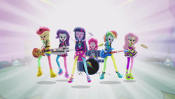 Size: 1276x720 | Tagged: safe, screencap, applejack, fluttershy, pinkie pie, rainbow dash, rarity, sunset shimmer, twilight sparkle, equestria girls, rainbow rocks, bass guitar, clothes, drums, guitar, jumping, keytar, lidded eyes, mane six, microphone, musical instrument, pantyhose, tambourine, the rainbooms