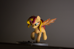 Size: 1000x667 | Tagged: safe, artist:alisterosenheim, sunset shimmer, pony, craft, fiery shimmer, fiery wings, frown, sculpture, solo, sunset phoenix, traditional art