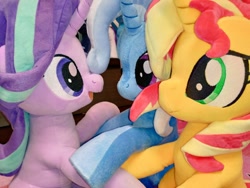 Size: 1024x768 | Tagged: safe, artist:nekokevin, starlight glimmer, sunset shimmer, trixie, pony, unicorn, series:nekokevin's glimmy, counterparts, female, happy, irl, looking at each other, magical trio, mare, open mouth, photo, plushie, raised hoof, smiling, twilight's counterparts