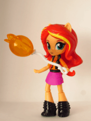 Size: 540x720 | Tagged: safe, artist:whatthehell!?, sunset shimmer, equestria girls, equestria girls series, animated, boots, candy, clothes, doll, equestria girls minis, food, gif, globe, lollipop, loop, shoes, skirt, stop motion, theme park, toy