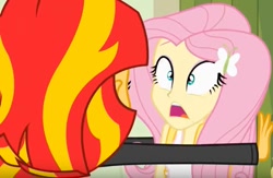 Size: 664x432 | Tagged: safe, screencap, fluttershy, sunset shimmer, equestria girls, equestria girls (movie), lockers, rear view