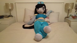 Size: 5312x2988 | Tagged: safe, artist:bigsexyplush, artist:somethingaboutoctavia, octavia melody, anthro, saddle arabian, unguligrade anthro, absurd resolution, anthro plushie, bed, bedroom eyes, belly, belly button, belly dancer, clothes, costume, crossed legs, crossover, cute, disney, doll, hat, hooves, irl, midriff, outfit, photo, plushie, pose, princess jasmine, saddle arabian outfit, solo, tavibetes, thunder thighs, toy, wide hips