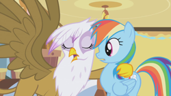 Size: 1280x720 | Tagged: safe, derpibooru import, screencap, gilda, rainbow dash, griffon, pegasus, pony, griffon the brush off, hug