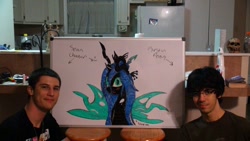 Size: 1024x576 | Tagged: safe, queen chrysalis, changeling, changeling queen, brony, female, horn, photo, whiteboard