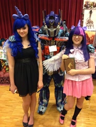 Size: 3264x2448 | Tagged: safe, princess luna, twilight sparkle, twilight sparkle (alicorn), human, convention, cosplay, hasbro, irl, irl human, optimus prime, photo, sideways image, transformers