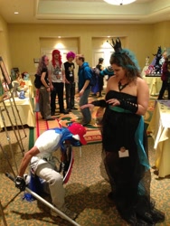 Size: 2448x3264 | Tagged: safe, queen chrysalis, shining armor, human, bro, clothes, cosplay, dress, hat, irl, irl human, kneeling, photo, shield, sword, wat, weapon