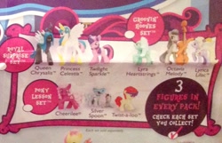 Size: 1105x713 | Tagged: safe, cheerilee, lyra heartstrings, lyrica lilac, octavia melody, queen chrysalis, silver spoon, smarty pants, twilight sparkle, twist, changeling, changeling queen, earth pony, pony, cello, cropped, figure, musical instrument, name, names, official, toy