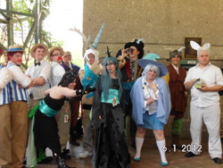 Size: 900x675 | Tagged: safe, artist:bunnyloca, artist:concolor22, angel bunny, discord, flam, flim, queen chrysalis, trixie, human, a-kon, antagonist, convention, cosplay, flim flam brothers, group photo, irl, irl human, old photo, photo