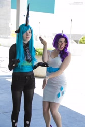 Size: 2304x3456 | Tagged: safe, artist:canhardlyfly, artist:thestormypetrelofcosplay, queen chrysalis, rarity, human, anime expo, cosplay, irl, irl human, photo