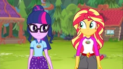 Size: 1100x618 | Tagged: safe, screencap, sci-twi, sunset shimmer, twilight sparkle, equestria girls, legend of everfree, camp everfree outfits, clothes, crescent moon, glasses, moon, shorts, sun, totem pole, tree