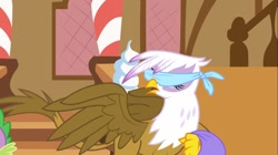 Size: 1100x618 | Tagged: safe, derpibooru import, screencap, gilda, spike, dragon, griffon, griffon the brush off, blindfold