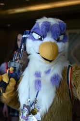 Size: 600x901 | Tagged: safe, artist:neouka, artist:spainfischer, derpibooru import, gilda, griffon, human, fursuit, gun, handgun, irl, irl human, photo, pistol, toy, toy gun