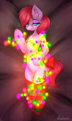 Size: 1200x2000 | Tagged: safe, artist:cornelia_nelson, oc, oc only, oc:holly daze, earth pony, pony, bedroom eyes, bow, clothes, cute, digital art, ear fluff, female, garland, looking at you, lying, mare, signature, smiling, smirk, socks, solo, tail bow, thigh highs, ych result